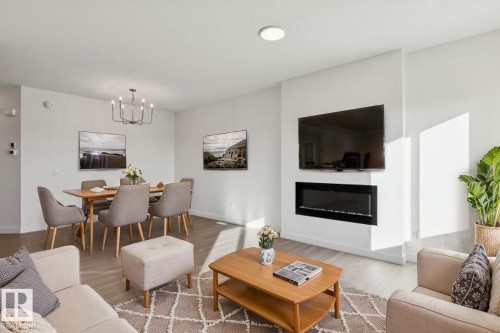 19027 20 Avenue, Edmonton, AB - Indoor Photo Showing Living Room With Fireplace
