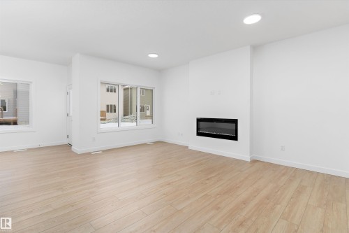 4015 208 Street, Edmonton, AB - Indoor Photo Showing Living Room With Fireplace