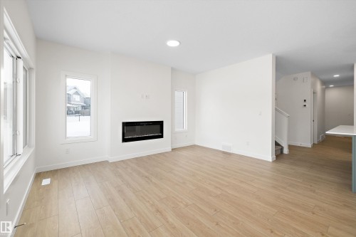 17553 62A Street, Edmonton, AB - Indoor Photo Showing Living Room With Fireplace