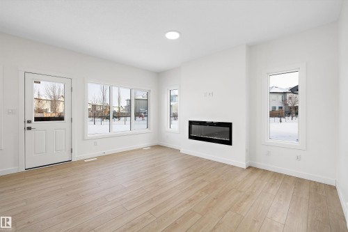 17553 62A Street, Edmonton, AB - Indoor Photo Showing Living Room With Fireplace