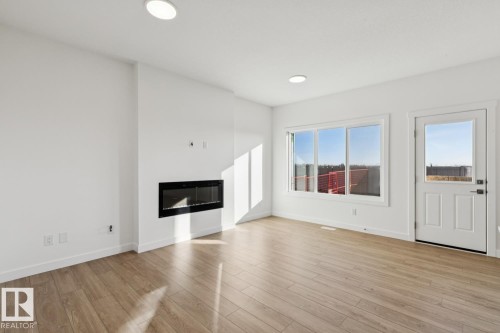 19043 20 Avenue, Edmonton, AB - Indoor Photo Showing Living Room With Fireplace