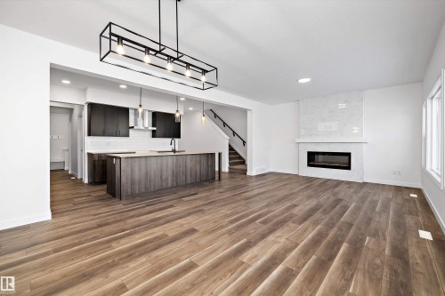 17325 6A Street, Edmonton, AB - Indoor Photo Showing Living Room With Fireplace