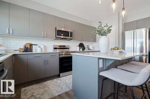 20 Emerald Way, Spruce Grove, AB - Indoor Photo Showing Kitchen With Upgraded Kitchen