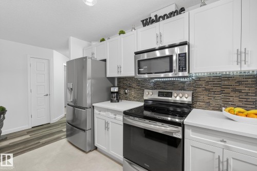 134 11505 Ellerslie Road, Edmonton, AB - Indoor Photo Showing Kitchen With Upgraded Kitchen
