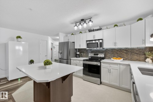 134 11505 Ellerslie Road, Edmonton, AB - Indoor Photo Showing Kitchen With Upgraded Kitchen