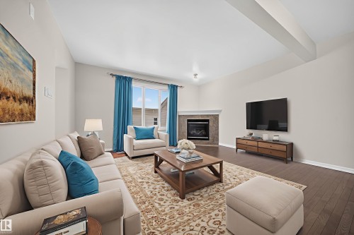 4216 Alexander Bay, Edmonton, AB - Indoor Photo Showing Living Room With Fireplace