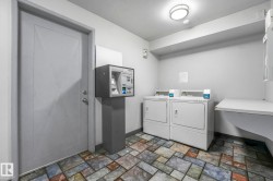 Shared laundry featuring washer and clothes dryer - 