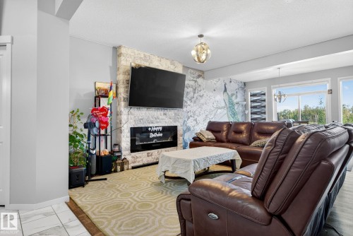 2171 51 Street, Edmonton, AB - Indoor Photo Showing Living Room With Fireplace