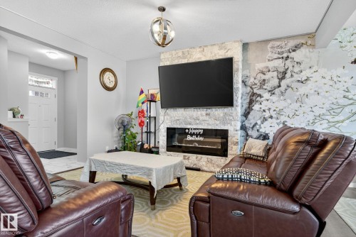 2171 51 Street, Edmonton, AB - Indoor Photo Showing Living Room With Fireplace