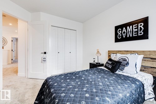 301 Juniper Cove, Leduc, AB - Indoor Photo Showing Bedroom