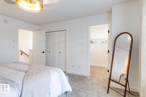 301 Juniper Cove, Leduc, AB - Indoor Photo Showing Bedroom