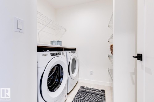 301 Juniper Cove, Leduc, AB - Indoor Photo Showing Laundry Room