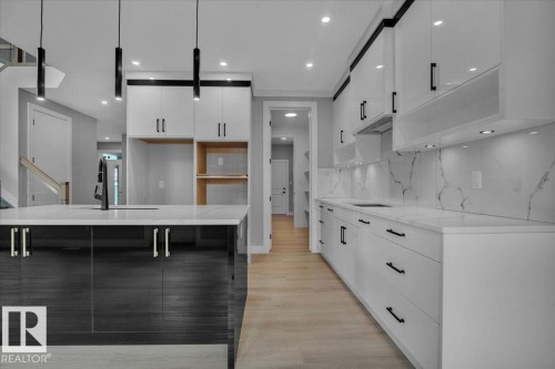 65 Blackbird Bend, Fort Saskatchewan, AB - Indoor Photo Showing Kitchen With Upgraded Kitchen