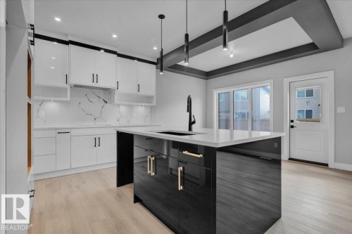 65 Blackbird Bend, Fort Saskatchewan, AB - Indoor Photo Showing Kitchen With Upgraded Kitchen