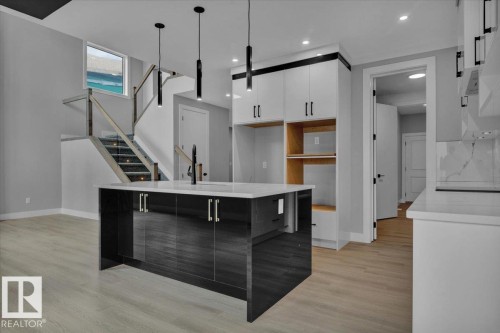 65 Blackbird Bend, Fort Saskatchewan, AB - Indoor Photo Showing Kitchen With Upgraded Kitchen