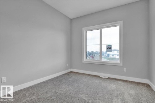 65 Blackbird Bend, Fort Saskatchewan, AB - Indoor Photo Showing Other Room