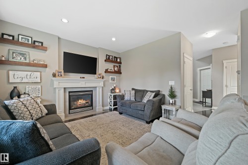 9 Viceroy Crescent, Olds, AB - Indoor Photo Showing Living Room With Fireplace