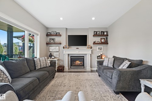 9 Viceroy Crescent, Olds, AB - Indoor Photo Showing Living Room With Fireplace