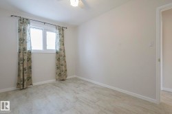 Spare room featuring ceiling fan and light flooring - 