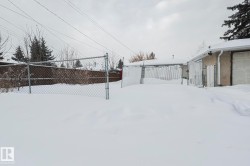 Snowy yard with a gate - 
