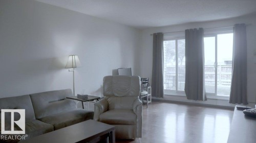 111 5125 Riverbend Road, Edmonton, AB - Indoor Photo Showing Living Room