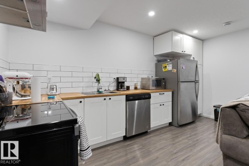 2147 Maple Road, Edmonton, AB - Indoor Photo Showing Kitchen With Double Sink