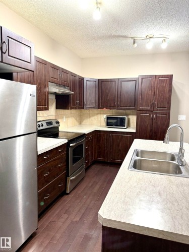 1432 72 Street, Edmonton, AB - Indoor Photo Showing Kitchen With Double Sink