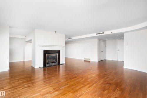 1402 10731 Saskatchewan Drive, Edmonton, AB - Indoor Photo Showing Living Room With Fireplace