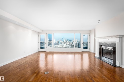1402 10731 Saskatchewan Drive, Edmonton, AB - Indoor Photo Showing Other Room With Fireplace