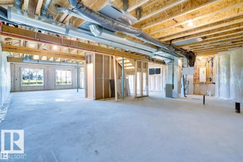 Basement featuring heating unit - 27 Rosewood Way, St. Albert, AB - Indoor Photo Showing Basement