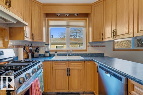 5004 144 Street, Edmonton, AB - Indoor Photo Showing Kitchen With Double Sink