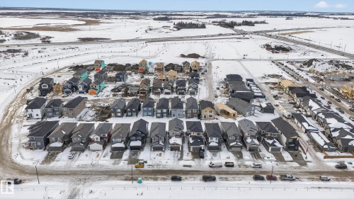 Snowy aerial view featuring a residential view - 19 Rosa Crescent, St. Albert, AB - Outdoor With View
