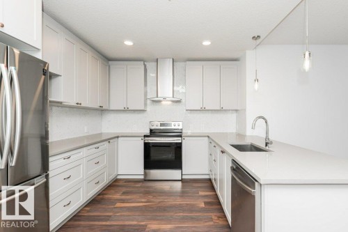306 1316 Windermere Way, Edmonton, AB - Indoor Photo Showing Kitchen With Stainless Steel Kitchen With Upgraded Kitchen