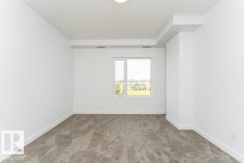 306 1316 Windermere Way, Edmonton, AB - Indoor Photo Showing Other Room