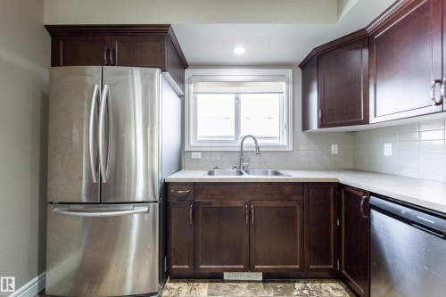 162 Desrochers Gate, Edmonton, AB - Indoor Photo Showing Kitchen With Stainless Steel Kitchen With Double Sink
