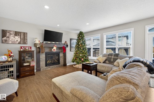 17838 60A Street, Edmonton, AB - Indoor Photo Showing Living Room With Fireplace