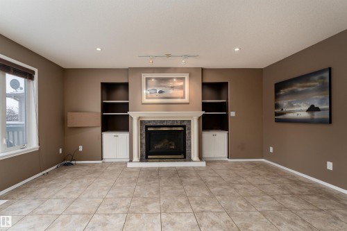 67 Dechene Road, Edmonton, AB - Indoor Photo Showing Living Room With Fireplace