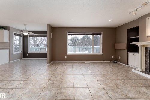 67 Dechene Road, Edmonton, AB - Indoor Photo Showing Other Room With Fireplace