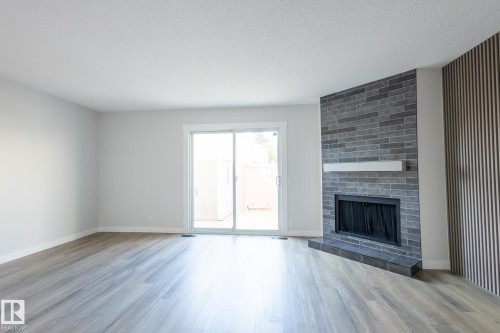 14035 121 Street, Edmonton, AB - Indoor Photo Showing Living Room With Fireplace