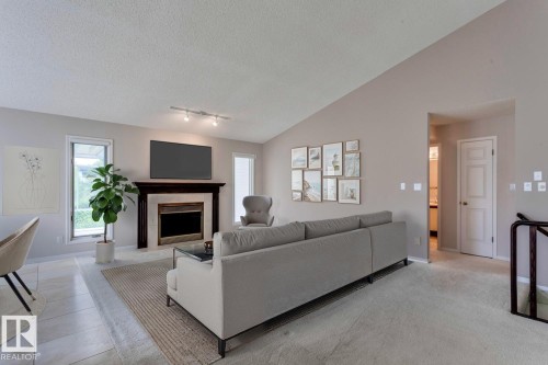 12416 29A Avenue, Edmonton, AB - Indoor Photo Showing Living Room With Fireplace