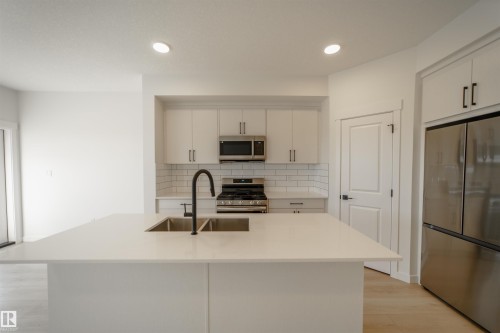 1303 Podersky Wynd, Edmonton, AB - Indoor Photo Showing Kitchen With Double Sink With Upgraded Kitchen