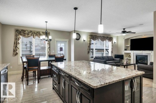 1908 86 Street, Edmonton, AB - Indoor Photo Showing Kitchen With Fireplace With Upgraded Kitchen