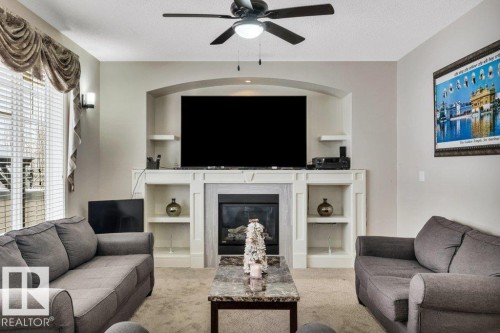 1908 86 Street, Edmonton, AB - Indoor Photo Showing Living Room With Fireplace