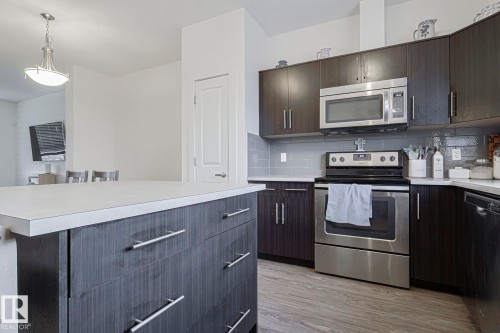 180 Southfork Drive, Leduc, AB - Indoor Photo Showing Kitchen With Upgraded Kitchen