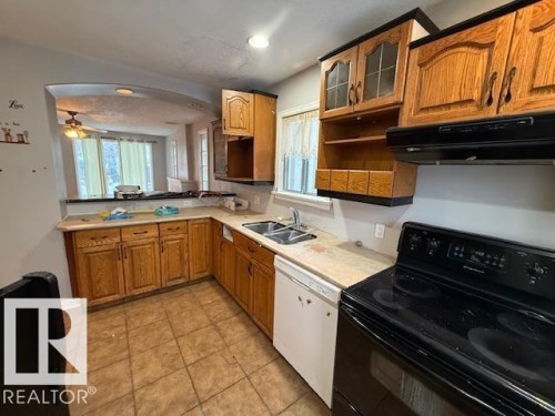 9811 78 Avenue, Edmonton, AB - Indoor Photo Showing Kitchen With Double Sink