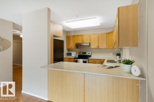 St. Albert, AB - Indoor Photo Showing Kitchen With Double Sink