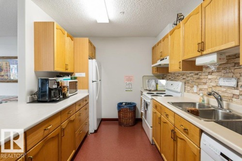 St. Albert, AB - Indoor Photo Showing Kitchen With Double Sink