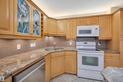 3410 135A Avenue, Edmonton, AB - Indoor Photo Showing Kitchen With Double Sink