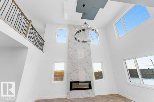 16724 34 Avenue, Edmonton, AB - Indoor Photo Showing Other Room With Fireplace