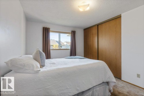 Edmonton, AB - Indoor Photo Showing Bedroom